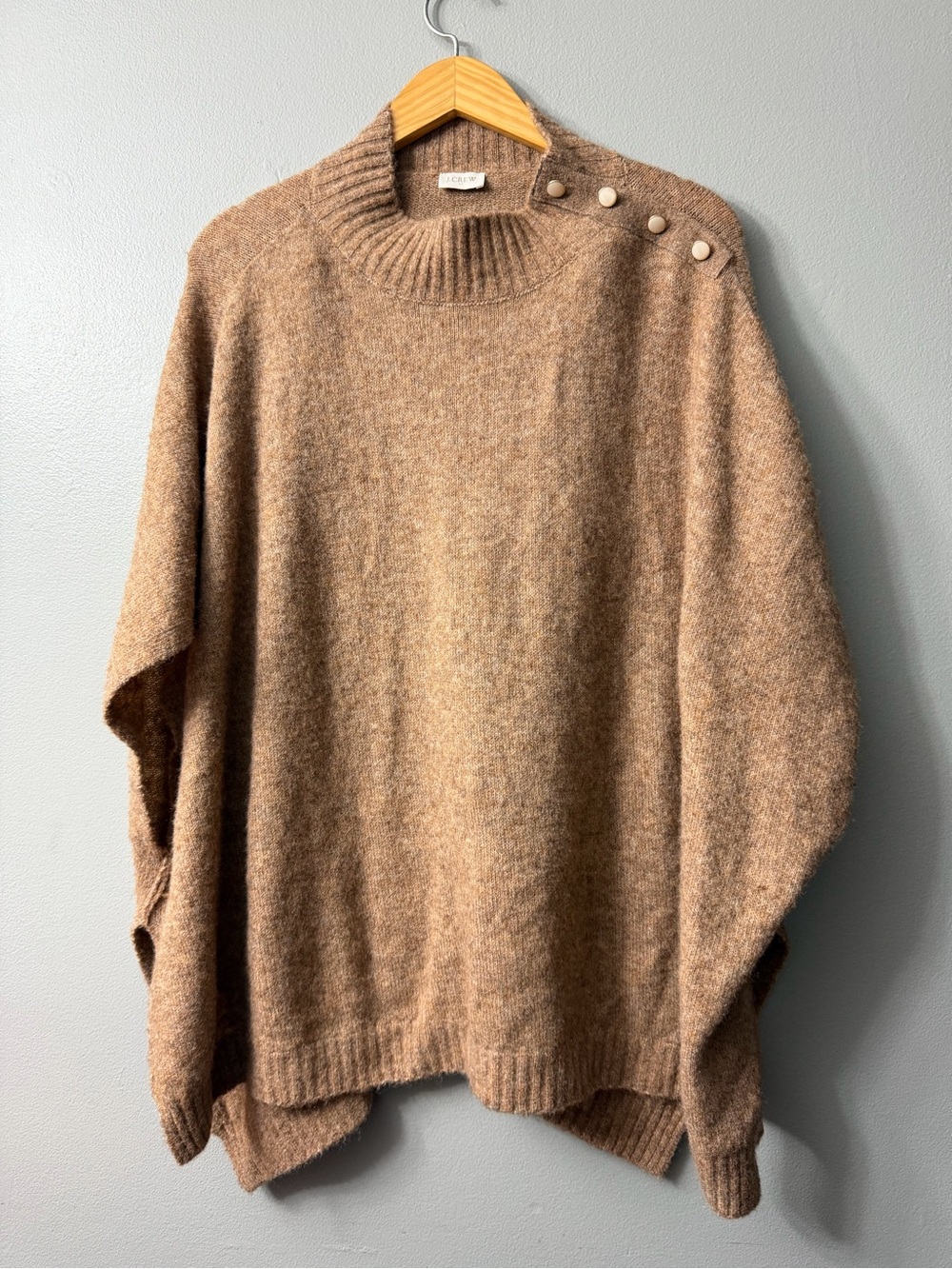 J.Crew button-neck knit poncho featuring a stylish shoulder button placket